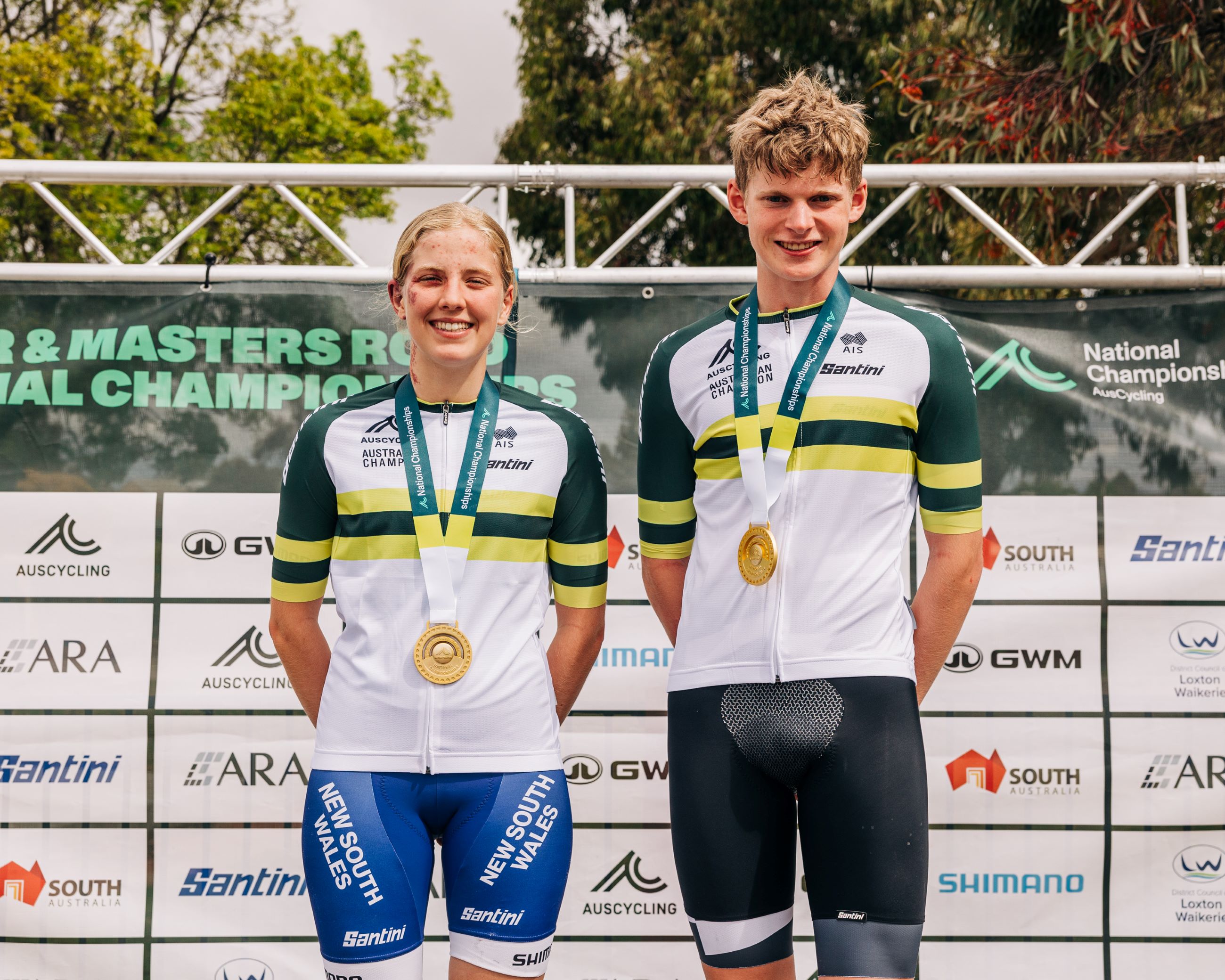 The winners of the under-17 men and women boys and girls road race championships in green-and-gold jerseys of Australian champion at the 2024 AusCycling Masters & Junior Road National Championships in Loxton